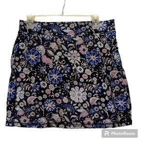 Talbot’s multicolored skort. Zippered pockets. Floral design in cotton.